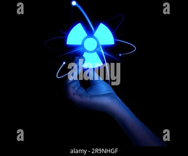 Woman holding glowing atom symbol with radiation warning sign on black background, closeup Stock Photo