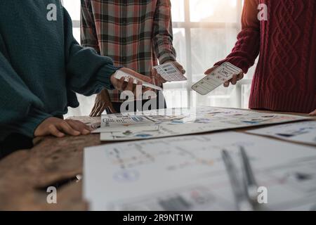 UX developer and ui designer brainstorming about mobile app interface wireframe design at modern office Stock Photo
