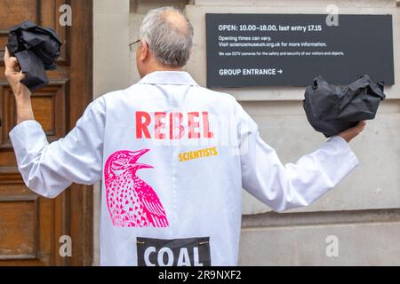 London, UK. 28th June, 2023. Extinction Rebellion Scientists stage an action at the Science Museum calling for an end to their collaboration with Adani, London, England, UK Credit: Denise Laura Baker/Alamy Live News Stock Photo