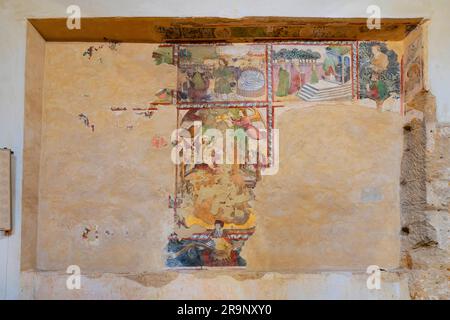 Wall paintings inside of Santa Maria dei Greci Church in Agrigento old town, including medieval mural dating back to the 14th century, Sicily, Italy. Stock Photo