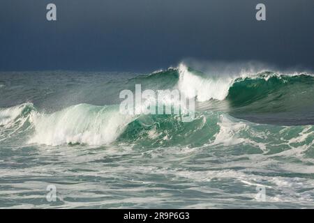 Large waves breaking in winter storm in open sea off north coast of Ireland. Fintra Beach in County Donegal Stock Photo