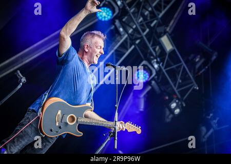 Joe Sumner performing live on stage at Bedford Park in a concert to show support for Dagny and Sting and their music Stock Photo