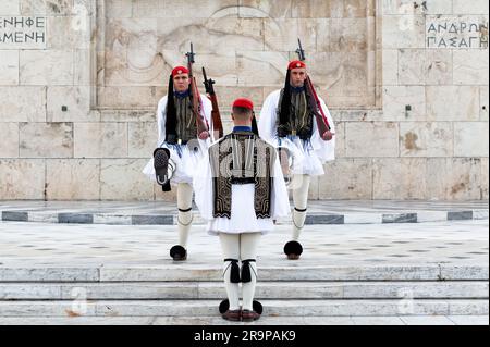Athens, Greece - December 26, 2019: Two members of the Presidential Guard soldiers (evzones) in the city center of the Greek capital - concept history Stock Photo