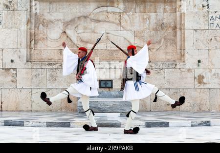 Athens, Greece - December 26, 2019: Two members of the Presidential Guard soldiers (evzones) in the city center of the Greek capital - concept history Stock Photo