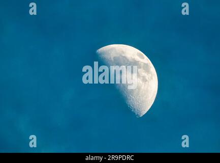 Early evening moon in a Florida sky Stock Photo