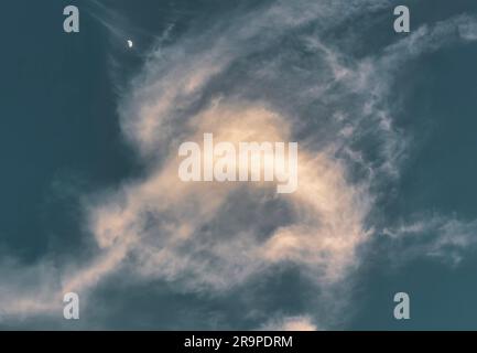Early evening moon in a Florida sky Stock Photo