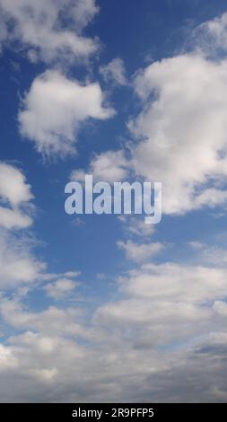 white clouds and blue sky cloudscape backdrop Stock Photo