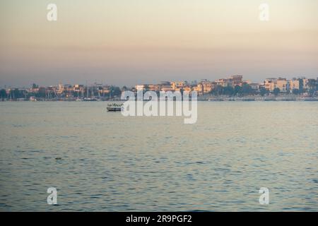 Egyptian Boat on the Nile River during Sunset Stock Photo