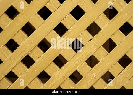 Yellow diagonal wooden grating close up Stock Photo