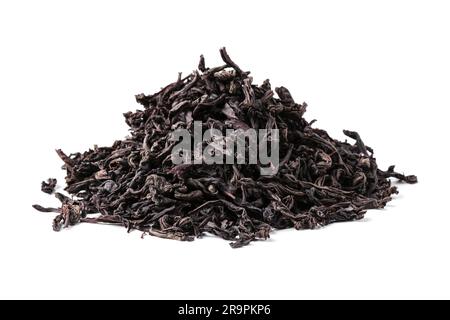 Dried tea leaves in a heap isolated on a white background Stock Photo