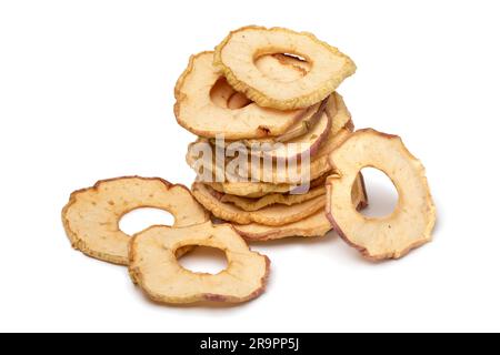 Heap of dried apple chips isolated on white background Stock Photo