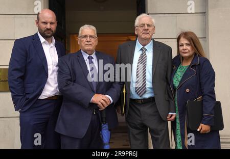 (left to right) Omagh bomb solicitor John Fox, Omagh bomb campaigners Stanley McCombe who lost his wife Ann, Michael Gallagher, who lost his son Aiden, and his daughter Cat Gallagher-wilkinson arrive for a meeting with Tanaiste Micheal Martin and Justice Minister Helen McEntee at Iveagh House, Dublin. Picture date: Wednesday June 28, 2023. Stock Photo