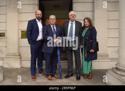 (left to right) Omagh bomb solicitor John Fox, Omagh bomb campaigners Stanley McCombe who lost his wife Ann, Michael Gallagher, who lost his son Aiden, and his daughter Cat Gallagher-wilkinson arrive for a meeting with Tanaiste Micheal Martin and Justice Minister Helen McEntee at Iveagh House, Dublin. Picture date: Wednesday June 28, 2023. Stock Photo