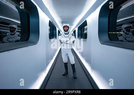 SpaceX Crew-6 Dry Dress Rehearsal. NASA SpaceX Crew-6 astronaut and mission specialist Sultan Alneyadi, UAE (United Arab Emirates), stands inside the crew access arm leading to the SpaceX Dragon spacecraft Endeavour during a countdown dress rehearsal at NASA’s Kennedy Space Center in Florida on Feb. 23, 2023. Alnayadi, along with NASA astronaut Warren “Woody” Hoburg, pilot; NASA astronaut Stephen Bowen, spacecraft commander; and ndrei Fedyaev, Roscosmos cosmonaut and mission specialist will launch to the International Space Station aboard the Crew Dragon Endeavour on a SpaceX Falcon 9. Launch Stock Photo