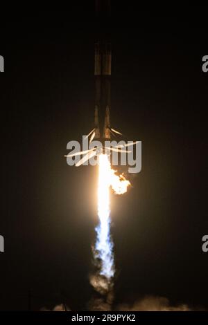 SWOT Launch. A SpaceX Falcon 9 first-stage booster returns to the landing pad following the launch of the Surface Water and Ocean Topography (SWOT) spacecraft, Friday, Dec. 16, 2022, from Space Launch Complex 4E at Vandenberg Space Force Base in California. Jointly developed by NASA and Centre National D'Etudes Spatiales (CNES), with contributions from the Canadian Space Agency (CSA) and United Kingdom Space Agency, SWOT is the first satellite mission that will observe nearly all water on Earth’s surface, measuring the height of water in the planet’s lakes, rivers, reservoirs, and the ocean. Stock Photo