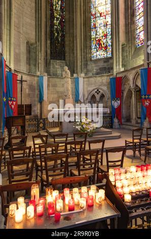 The Chapel of St Joan of Arc, decorated with flags, pennants and candles, Rouen Cathedral of Notre Dame interior, Rouen Normandy France Stock Photo