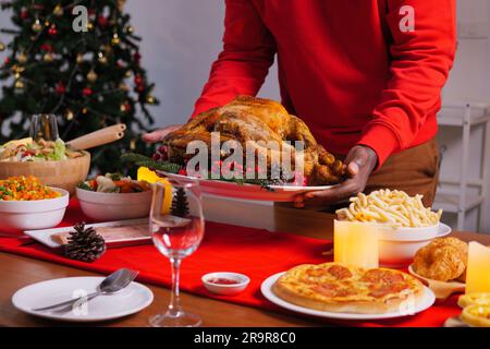 Christmas dinner with roasted turkey, Special food on table in the dinning room for Christmas dinner celebration, Christmas and Thanksgiving Stock Photo