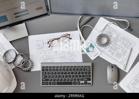 Top view background image of blueprints and plans on engineers workplace in office, copy space Stock Photo
