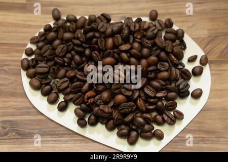 coffee beans on wooden background Stock Photo