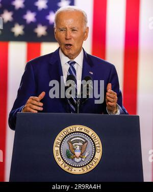 Chicago, United States. 28th June, 2023. US President Joe Biden stands in front of a large American flag as he speaks at the Old Post Office in Chicago, Illinois on Wednesday, June 28, 2023. Biden spoke on his economic plan, labeled 'Bidenomics,' to grow and strengthen the US economy. Photo by Tannen Maury/UPI Credit: UPI/Alamy Live News Stock Photo