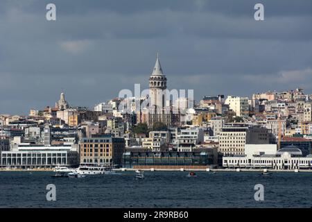 The Galata Tower and the districts of Karakoy and Beyoglu along the Strait of Bosphorus on the European side of Istanbul, Turkey / Turkiye. Stock Photo