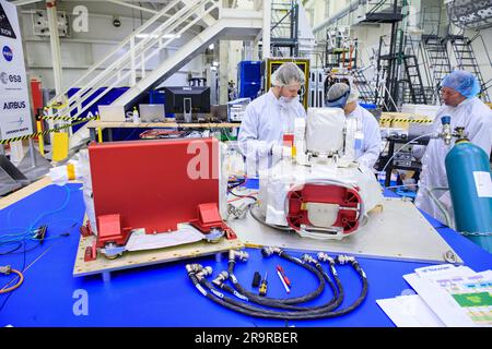 OpComm Delivery For Orion Artemis II. Inside the high bay of the Neil Armstrong Operations and Checkout Building at NASA’s Kennedy Space Center in Florida, technicians assemble on the Optical Communications System for the Artemis II mission on June 2, 2023. Optical communications is the latest space communications technology that is able to provide data rates as much as a hundred times higher than current systems. This will allow astronauts to send and receive ultra-high-definition video from the surface of the Moon or other planets such as Mars. Artemis II will be the first Artemis mission fl Stock Photo