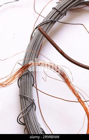Large coil of wire on the table close up Stock Photo