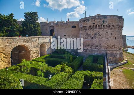 Aragonese Castle of Taranto and revolving bridge on the channel between Big and Small sea, Puglia, Italy, Blue sunny sky Stock Photo