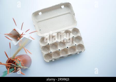 egg carton without eggs on table , Stock Photo