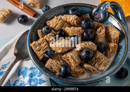 Whole wheat organic cereal with blueberries. Above shot. Stock Photo