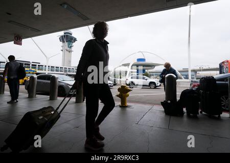 Los Angeles, California, USA. 28th June, 2023. Holiday travelers arrive at the Los Angeles International Airport in Los Angeles, Wednesday, June 28, 2023. (Credit Image: © Ringo Chiu/ZUMA Press Wire) EDITORIAL USAGE ONLY! Not for Commercial USAGE! Stock Photo