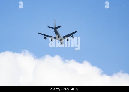 A U.S. Air Force KC-135 Stratotanker assigned to 203rd Air Refueling Squadron, 154th Wing, Hawaii Air National Guard, conducts a flyover during Operation Centennial Contact at Marine Corps Air Station Kaneohe Bay, Marine Corps Base Hawaii, June 27, 2023. The flyover commemorated the 100th anniversary of the first successful aerial refueling. More than 150 aircraft including KC-135 Stratotankers, KC-10 Extenders and KC-46 Pegasuses, conducted commemorative flyovers in all 50 states. (U.S. Marine Corps photo by Sgt. Julian Elliott-Drouin) Stock Photo