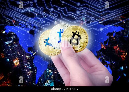Man holding bitcoins against digital scheme, world map and cityscape, closeup Stock Photo