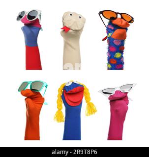 Many colorful sock puppets on white background, collage design Stock Photo