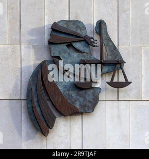 Sculpture of Justice or Scales of Justice, aka Lady Justice, at entrance to Criminal Courts of Justice, Parkgate Street/Phoenix Park, Dublin City, Ireland Stock Photo