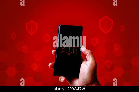 Hand holding smart phone with phone technology cyber security concept on red abstract background. Stock Photo