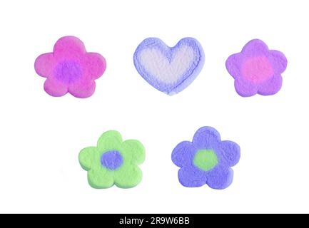 Group of vibrant colored flowers and heart shaped marshmallow candy on white background Stock Photo