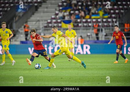 Non Exclusive: BUCHAREST, ROMANIA - JUNE 27, 2023 - Midfielder Ivan Zhelizko (R) of Ukraine and midfielder Adrian Bernabe of Spain are seen in action Stock Photo