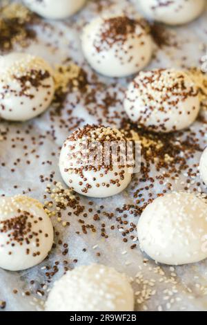 unbaked buns production of traditional sicilian food in an industrial bakery. Stock Photo