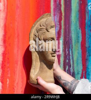 Shapiro Rare Books, London, UK. 29th June, 2023. London Art Week runs from 30th June-7th July and showcases work in London‘s leading galleries. At Shapiro Rare Books: Etruscan Terracotta Votive Profile Head of a Young Man, 4th century BC, at Rupert Wace. Credit: Malcolm Park/Alamy Live News Stock Photo