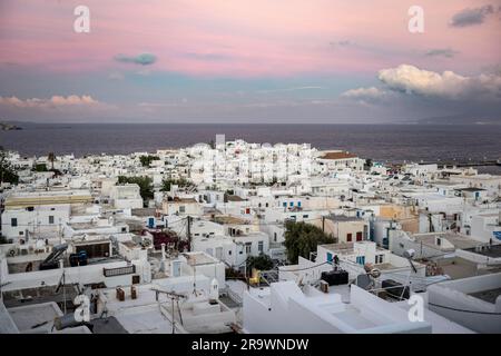 View over white Cycladic houses at sunrise, island and sea, Mykonos Town, Mykonos, Cyclades, Greece Stock Photo