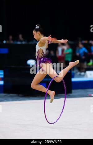 Gold Coast, Australia. 19th May, 2023. Australian Senior International Rhythmic Gymnast from Queensland, Riana Narushima, is catching hoop with her leg in the air during 2023 Australian Gymnastics Championships. Day 1 of the Australian Gymnastics Championship 2023, Gold Coast, Australia. Senior International Rhythmic Gymnastics session of the competition. (Photo by Alexander Bogatyrev/SOPA Images/Sipa USA) Credit: Sipa USA/Alamy Live News Stock Photo