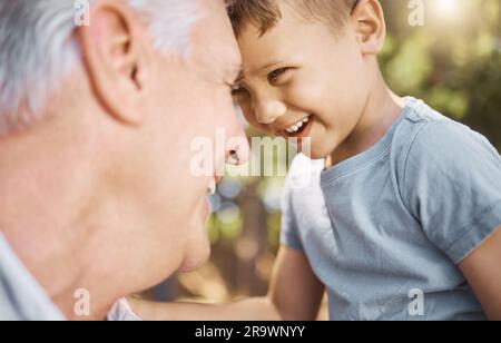 Children, camp and a grandpa hiking with his grandson outdoor in nature for bonding, travel or adventure together. Kids, face or funny and a little Stock Photo