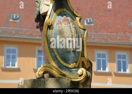 City coat of arms on the Mohrenbrunnen, market square, Eisenberg, Thuringia, Germany Stock Photo