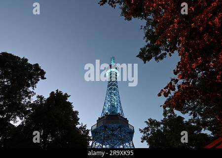 Prague, Czech Republic. 28th June, 2023. Petrin lookout tower illuminated on occasion celebration of the 300th anniversary of permanent public lighting in Prague, Czech Republic, June 28, 2023. Credit: Michal Kamaryt/CTK Photo/Alamy Live News Stock Photo