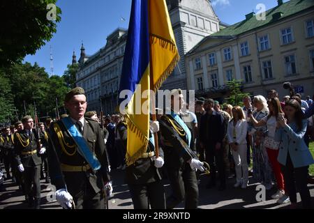 Lviv, Ukraine. 28th June, 2023. Cadets from the honor guard march during the celebration of the Constitution Day of Ukraine. Ukraine celebrated the 27th anniversary of the adoption of the country's basic law - the constitution. In the conditions of the Russian-Ukrainian war, official events were very short. In Lviv, the Ukrainian flag was raised, honor guard marched, and a military band performed. Credit: SOPA Images Limited/Alamy Live News Stock Photo