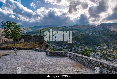 View at Gjirokaster old town city from Gjirokaster Citadel or castle with blue sky in the background Stock Photo