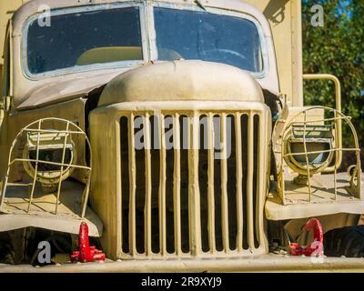 Front grill of old army truck at exhibition centre Stock Photo