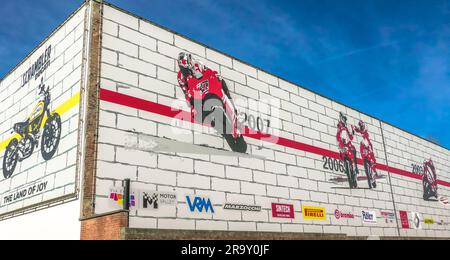 Bologna, Borgo Panigale, Italy - January 26, 2019: timeline paintings of Ducati motorcycles models in the Italian factory. Stock Photo