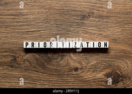 Prioritization - word concept on building blocks, text Stock Photo